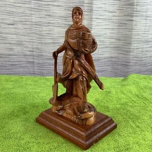 Statue carved in Olive Wood.🪷
